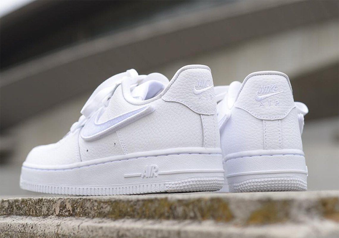 nike air force 1 trainers in white with interchangeable swooshes