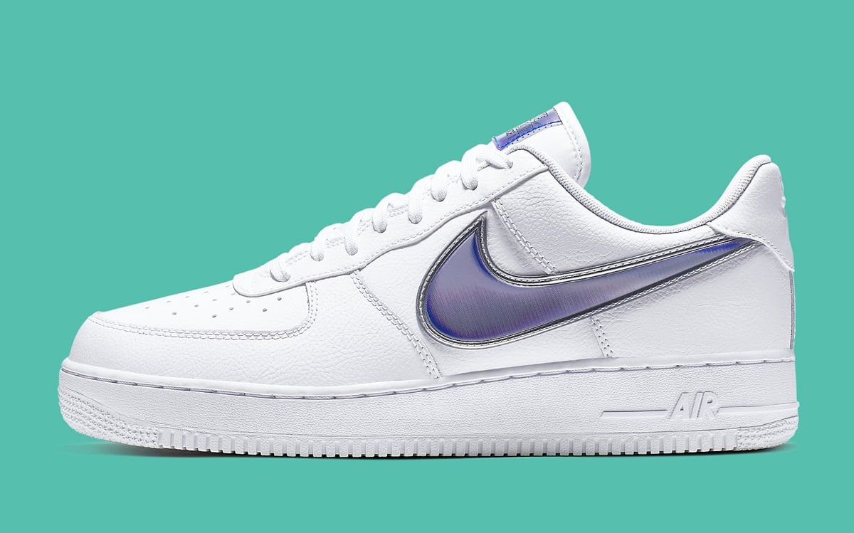 white nike shoes with purple swoosh