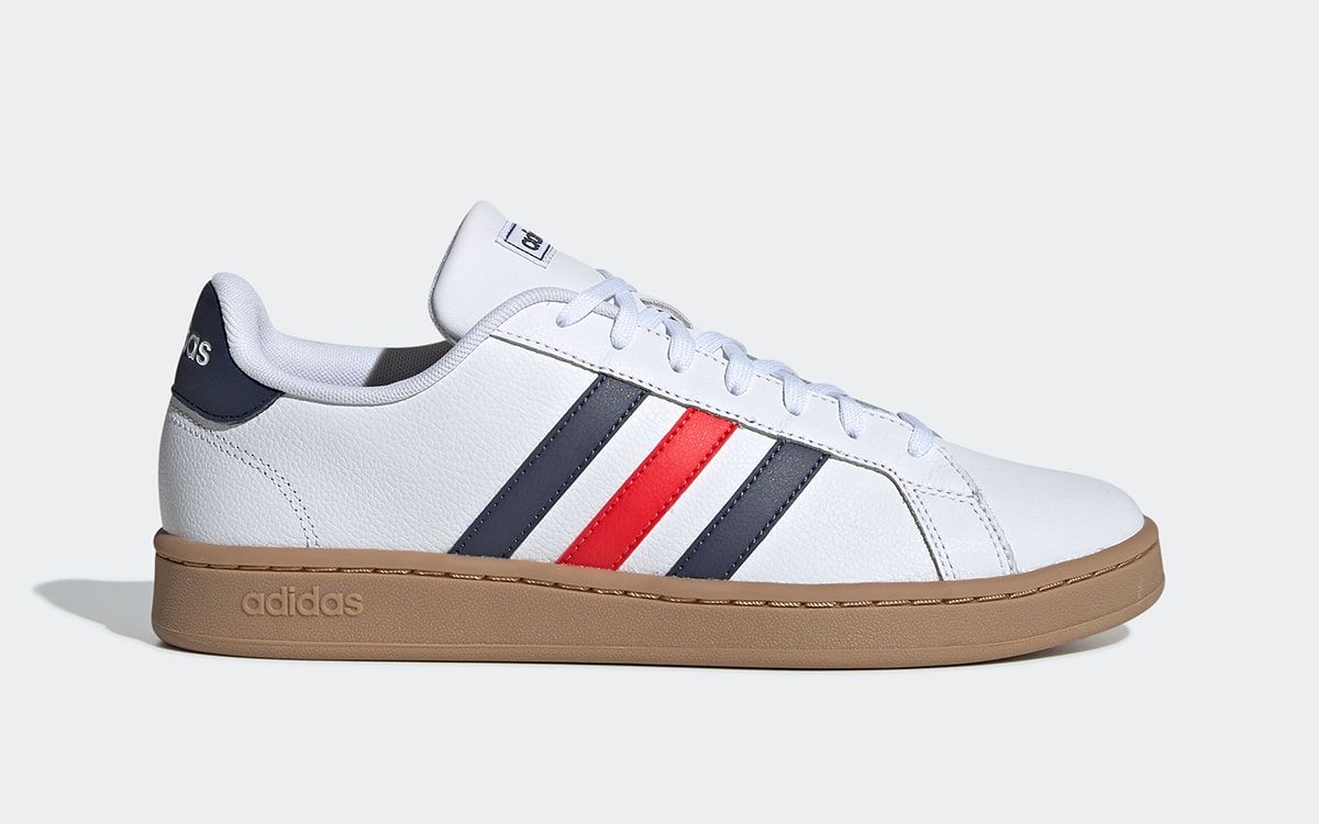 adidas shoes with red and blue on sole