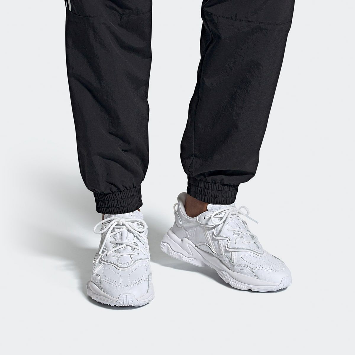 adidas originals ozweego sneakers in triple white