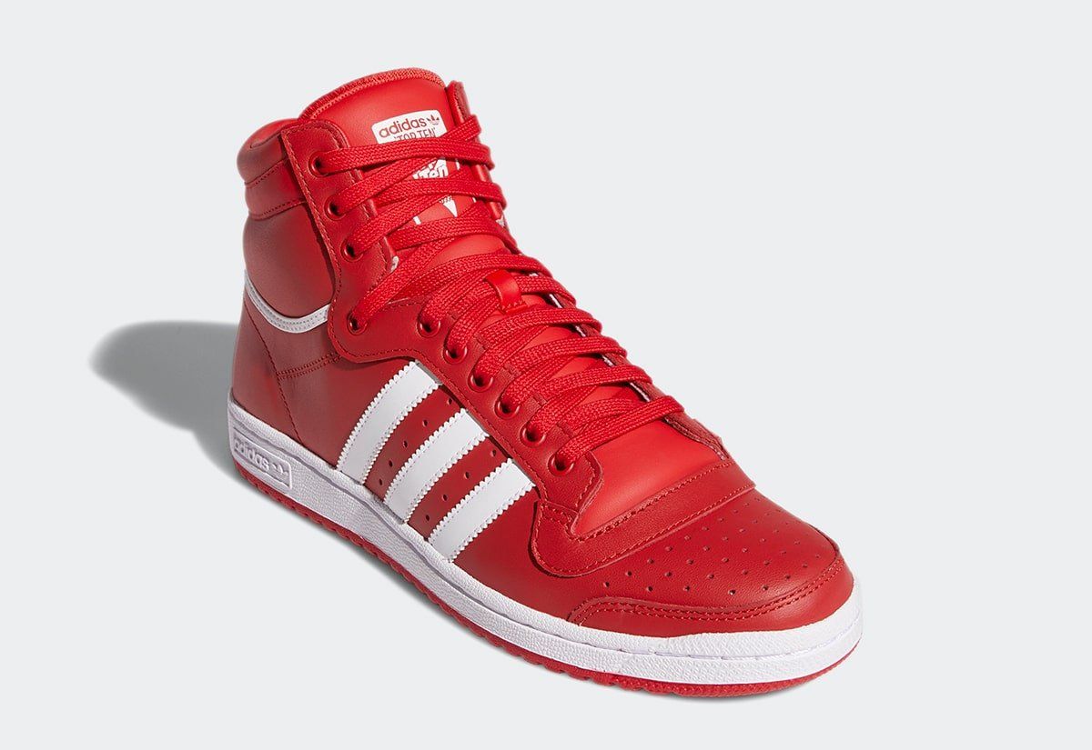 red and white high top adidas
