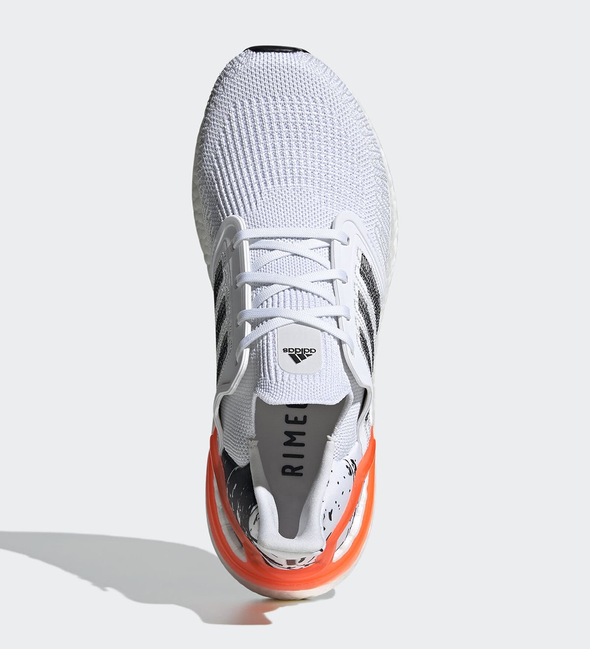orange and white adidas shoes