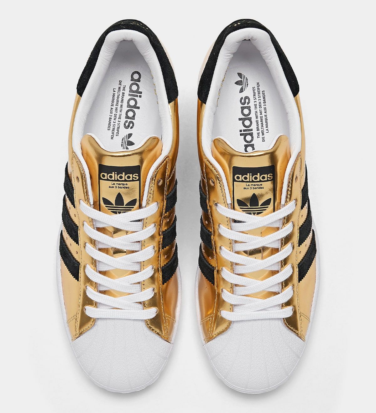 Available Now The Adidas Superstar Celebrates Its Golden Anniversary With A Bold Metallic Gold Finish House Of Heat Sneaker News Release Dates And Features