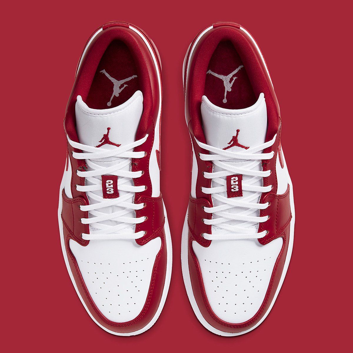 red and white low top jordans
