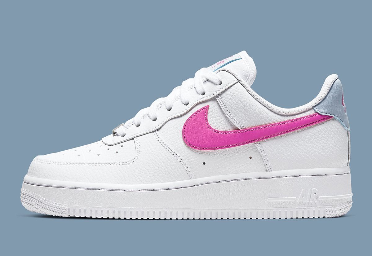 white nike air force 1 with pink swoosh
