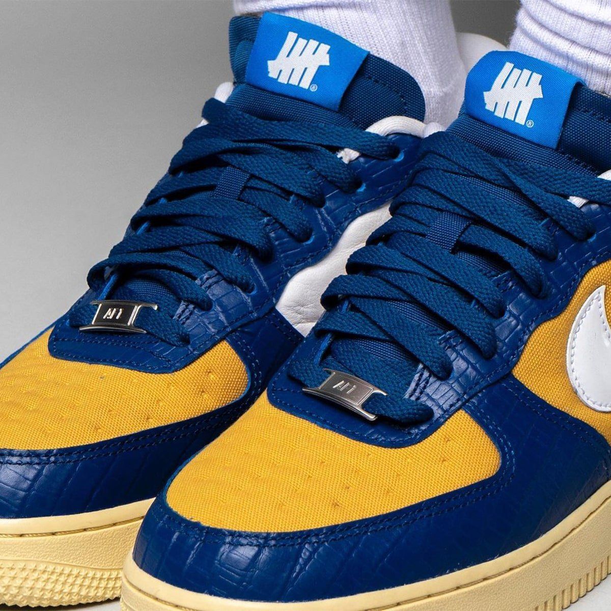 yellow and blue air force ones