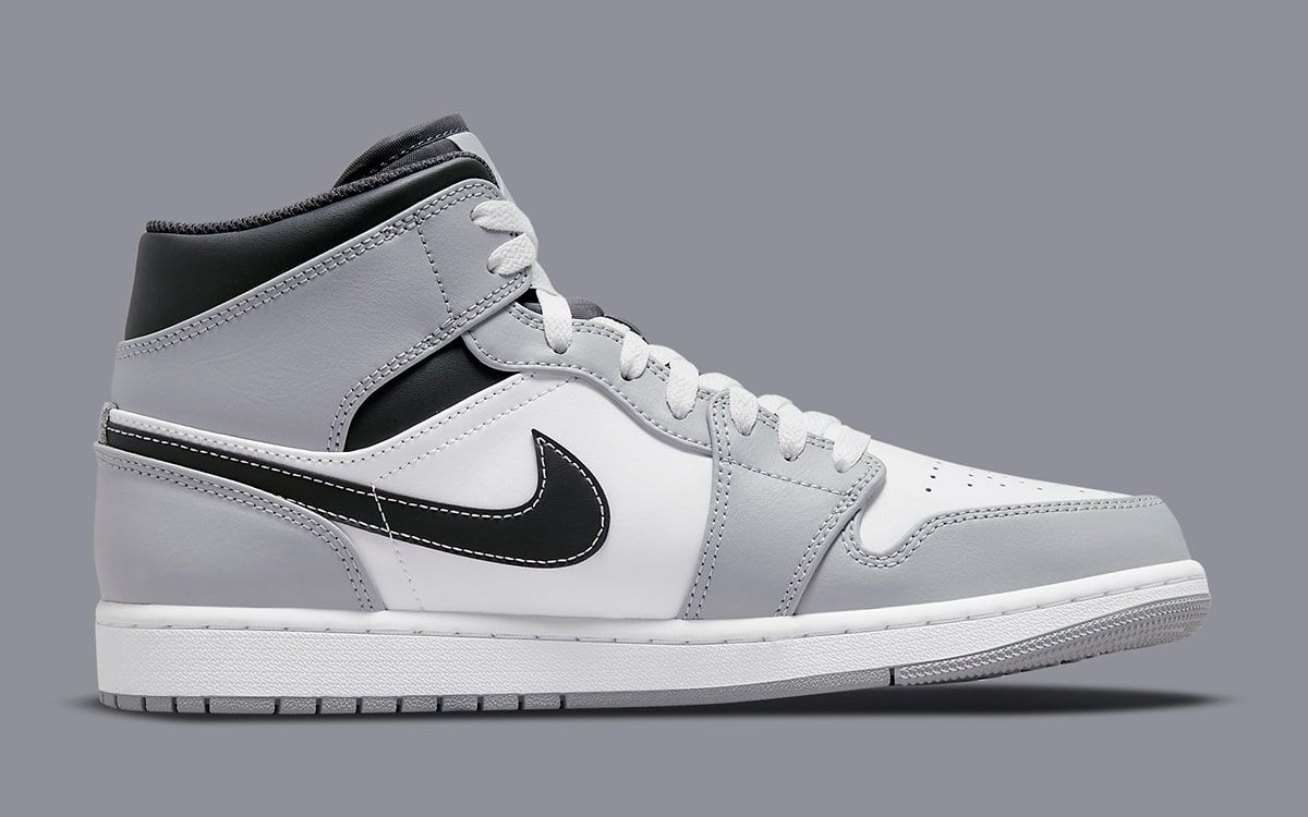 Contrast grey jordan 1's Stitch Swooshes Surface on This New Jordan 1 Mid | HOUSE