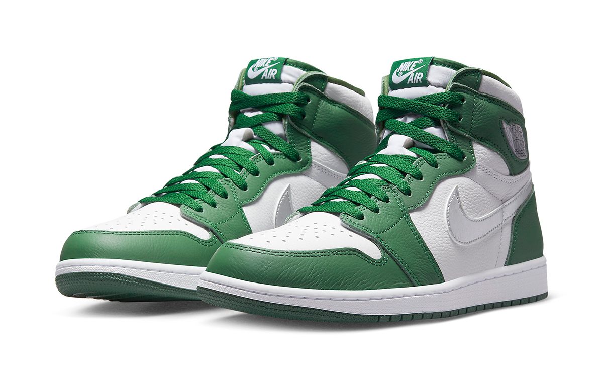green and white high top jordans